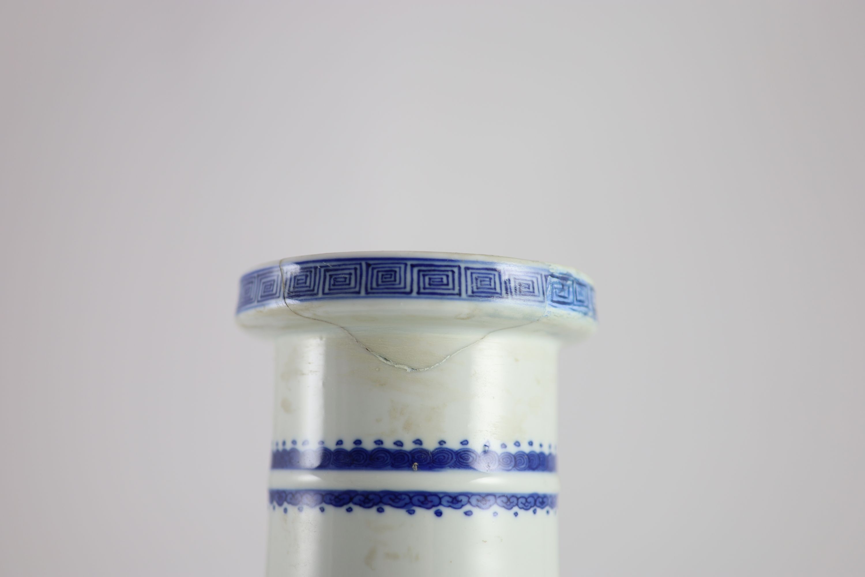 A Chinese blue and white rouleau vase, 19th century 44cm high, neck broken and restored